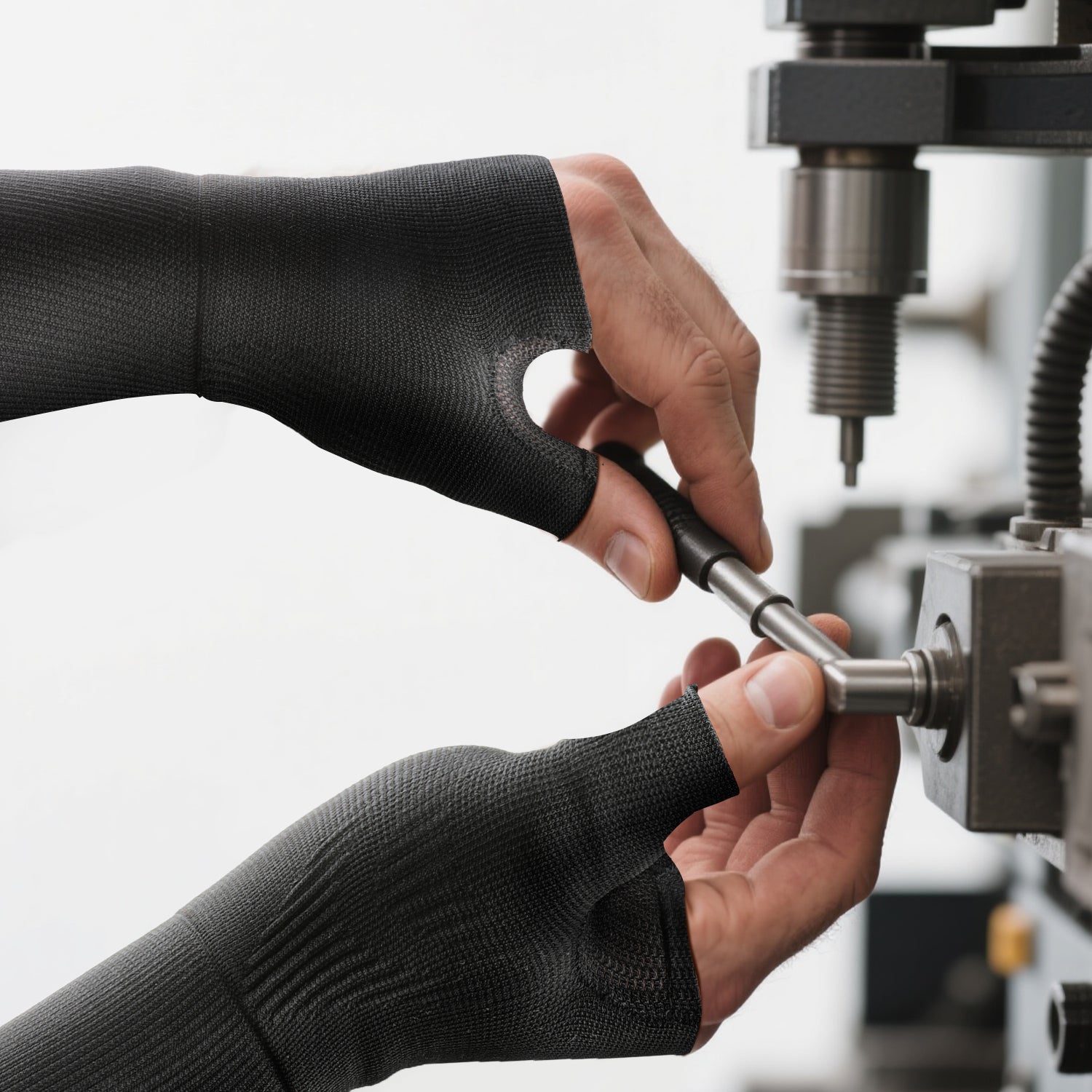 CMC Thumb Compression Sleeve for industrial work, providing support while allowing full finger dexterity