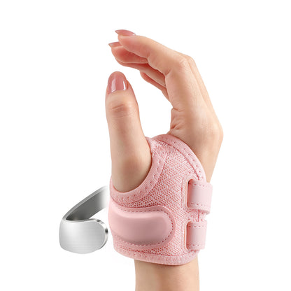 A woman with arthritis wearing a pink FORTEMOTUS thumb brace, while also showing the brace's built-in metal support strip.